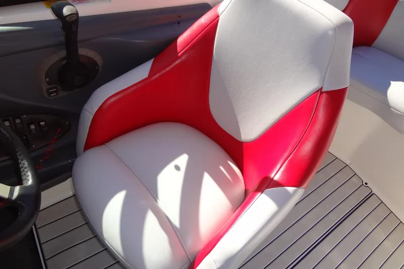 Slide: The Image of Red and white seat in 2003 Ski Centurion Tsunami boat interior. - 16