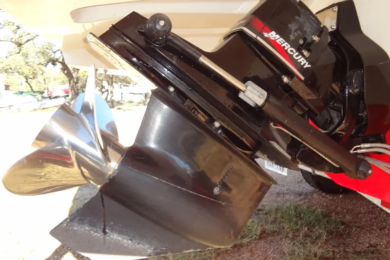 Slide: The Image of Close-up of a 2003 Ski Centurion Tsunami boat's Mercury outboard motor and propeller. - 37