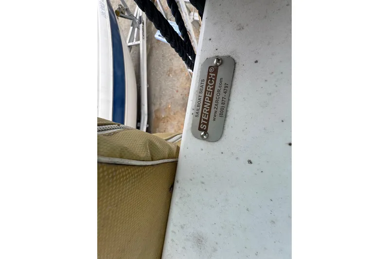 Slide: The Image of 1992 Hunter 33.5 sailboat with SternPerch seat label and ropes. - 19
