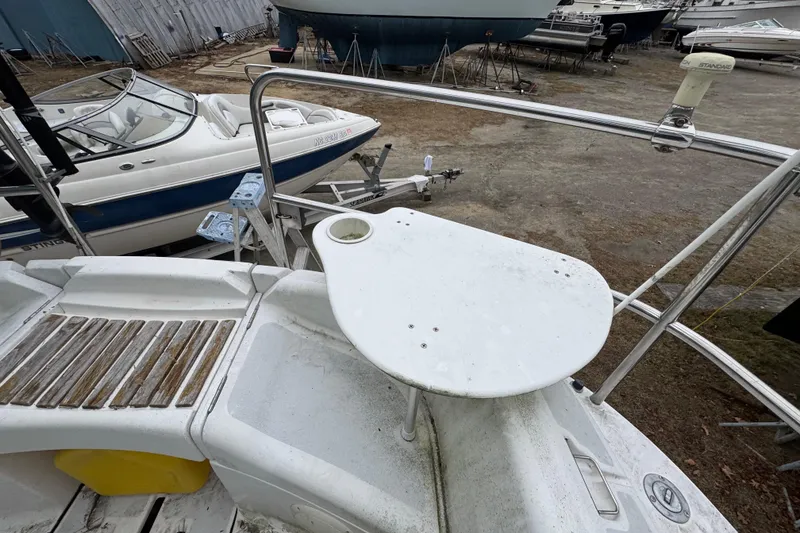 Slide: The Image of Deck view of a 1992 Hunter 33.5 sailboat in a boatyard. - 20