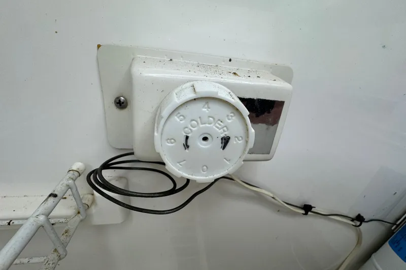 Slide: The Image of Thermostat dial on a Hunter 33.5, 1992 model, with temperature settings. - 48