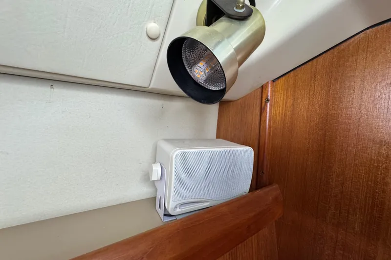 Slide: The Image of Interior of 1992 Hunter 33.5 yacht with speaker and spotlight. - 58