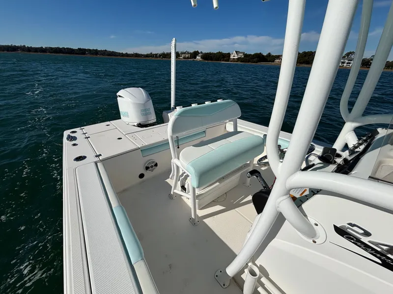 Slide: The Image of 2018 Robalo 246 Cayman boat on calm waters. - 16