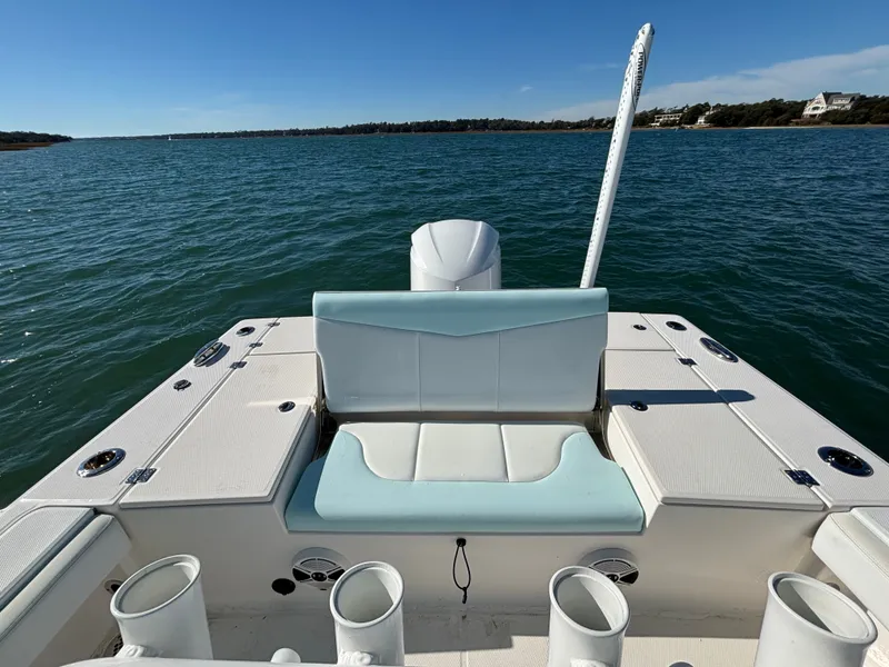 Slide: The Image of 2018 Robalo 246 Cayman on calm waters with clear view. - 22
