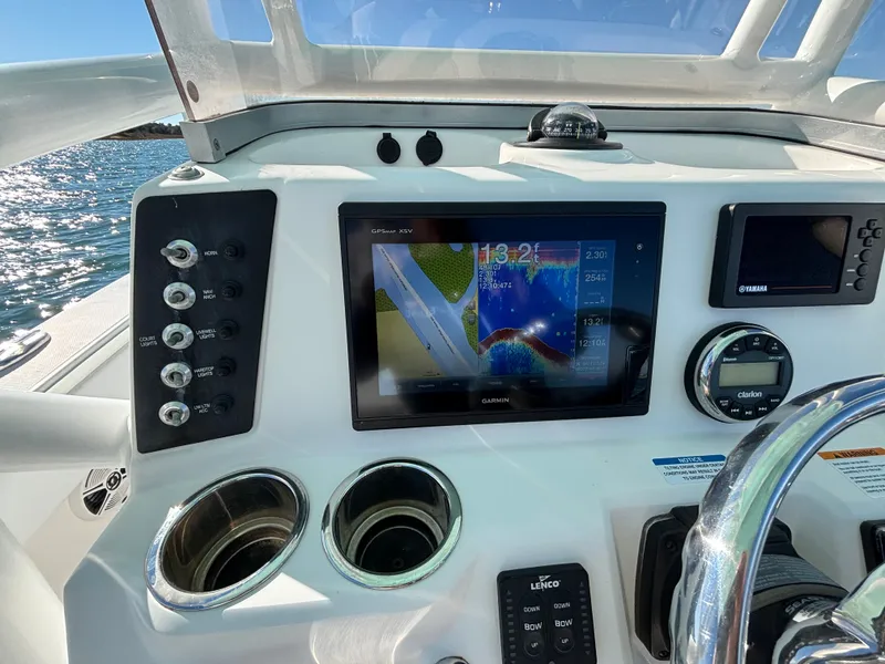 Slide: The Image of Dashboard of 2018 Robalo 246 Cayman with Garmin GPS. - 29