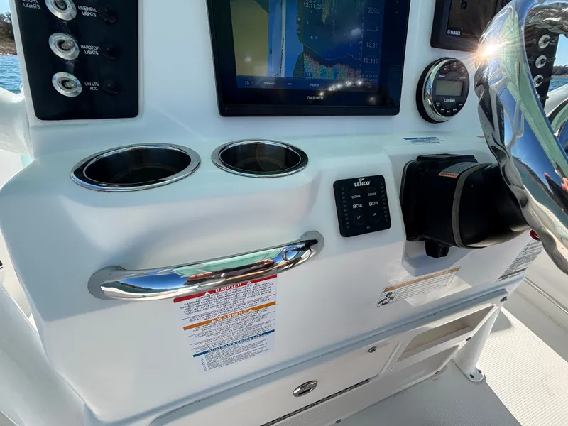 Slide: The Image of 2018 Robalo 246 Cayman helm with Garmin navigation system. - 33