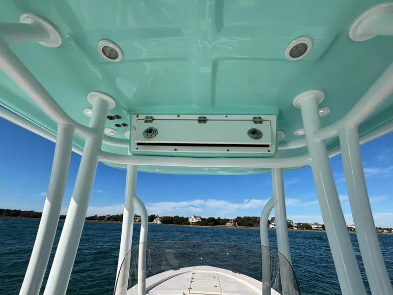 Slide: The Image of View from 2018 Robalo 246 Cayman boat over water. - 37