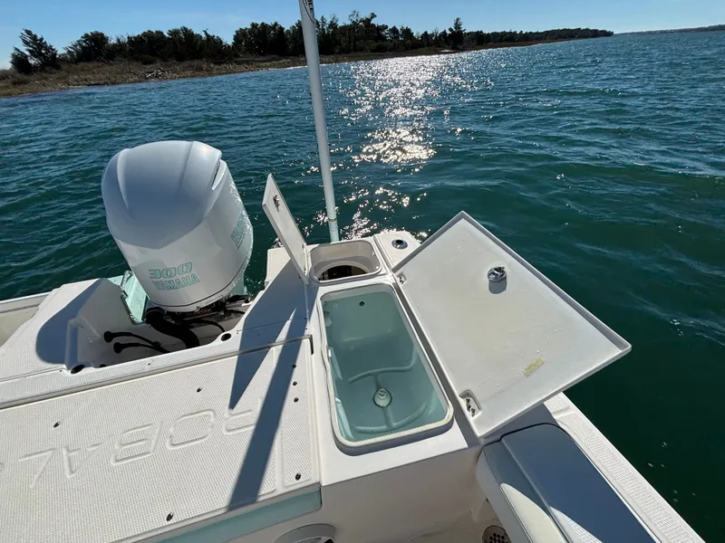 Slide: The Image of 2018 Robalo 246 Cayman with Yamaha engine on open water. - 40