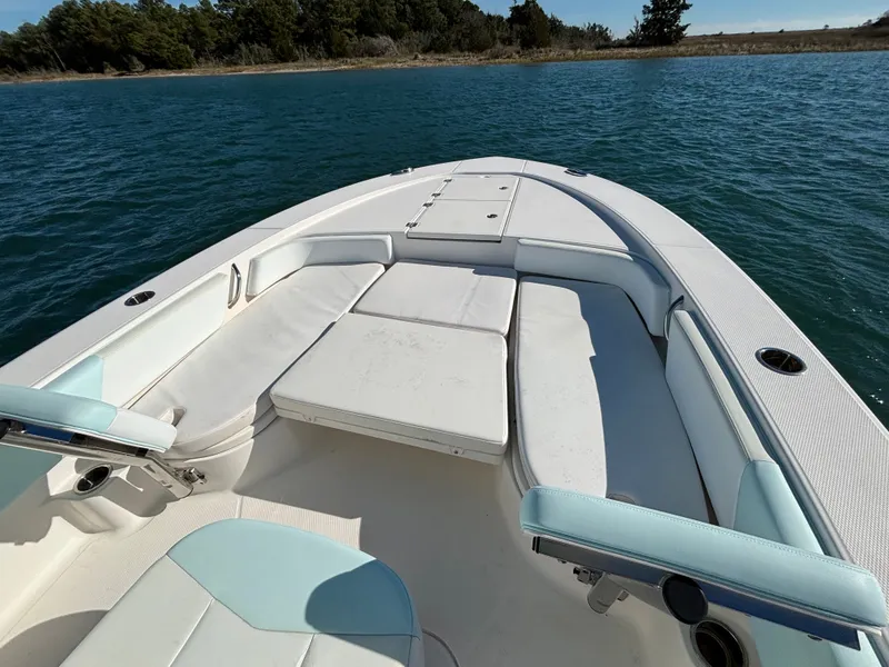 Slide: The Image of 2018 Robalo 246 Cayman boat on calm water. - 45