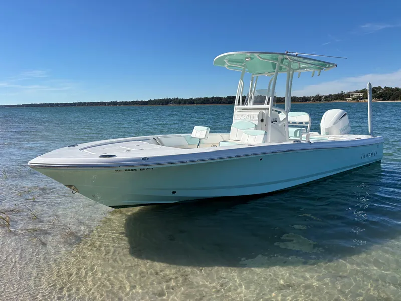 Slide: The Image of 2018 Robalo 246 Cayman boat in clear water. - 5