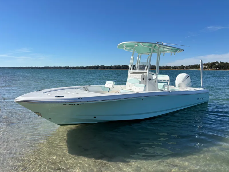 Slide: The Image of 2018 Robalo 246 Cayman boat in clear water. - 6