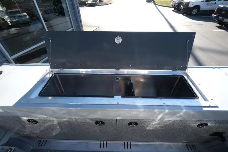 Slide: The Image of Open storage compartment on 2026 Hewescraft 180 Pro-V ET boat, exterior view. - 15