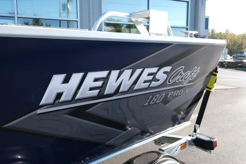Slide: The Image of 2026 Hewescraft 180 Pro-V ET boat on trailer, side view. - 6