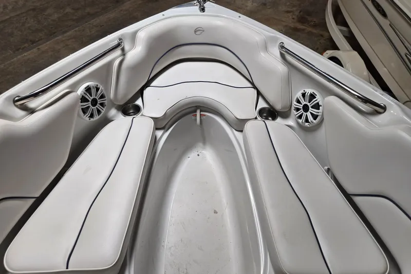 Slide: The Image of Interior of 2012 Crownline 195 SS boat with white seating and speakers. - 25