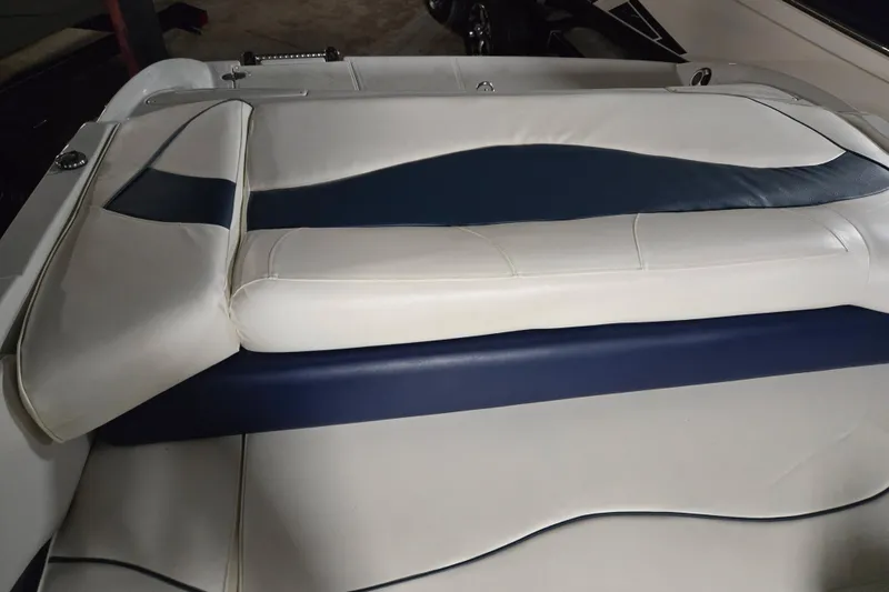 Slide: The Image of Crownline 195 SS 2012 boat interior with white and blue seating. - 27