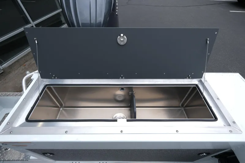 Slide: The Image of Open storage compartment on 2026 Hewescraft 190 SeaRunner ET boat. - 15