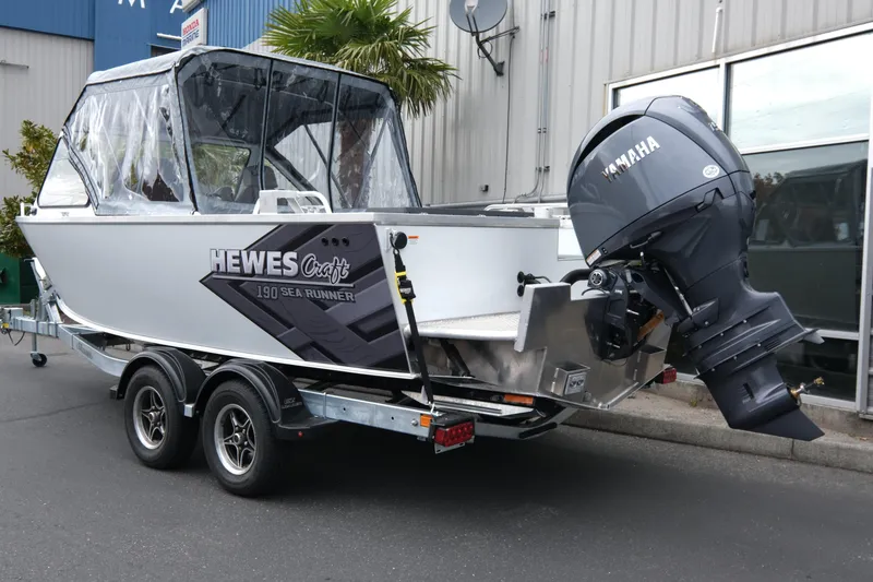 Slide: The Image of 2026 Hewescraft 190 SeaRunner ET boat with Yamaha outboard motor on trailer. - 4