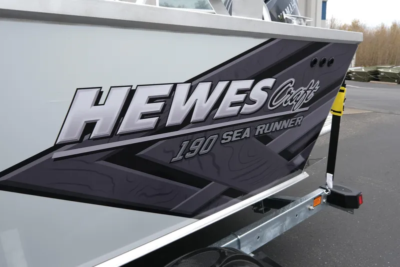 Slide: The Image of 2026 Hewescraft 190 SeaRunner ET boat on trailer, side view. - 6