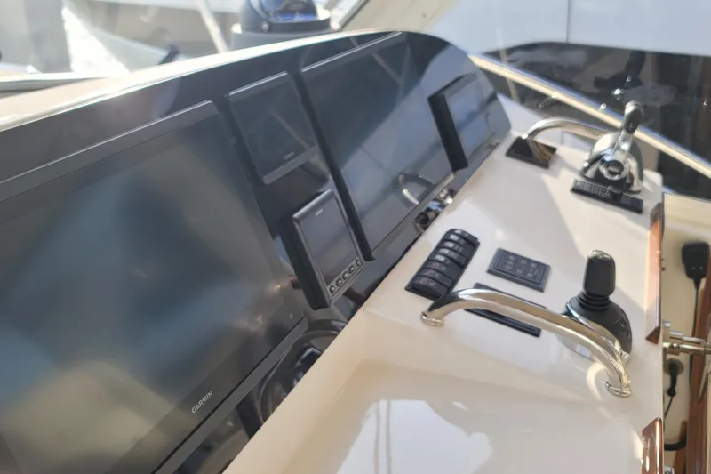 Slide: The Image of Helm of 2018 MJM 50z yacht with advanced navigation displays and controls. - 23