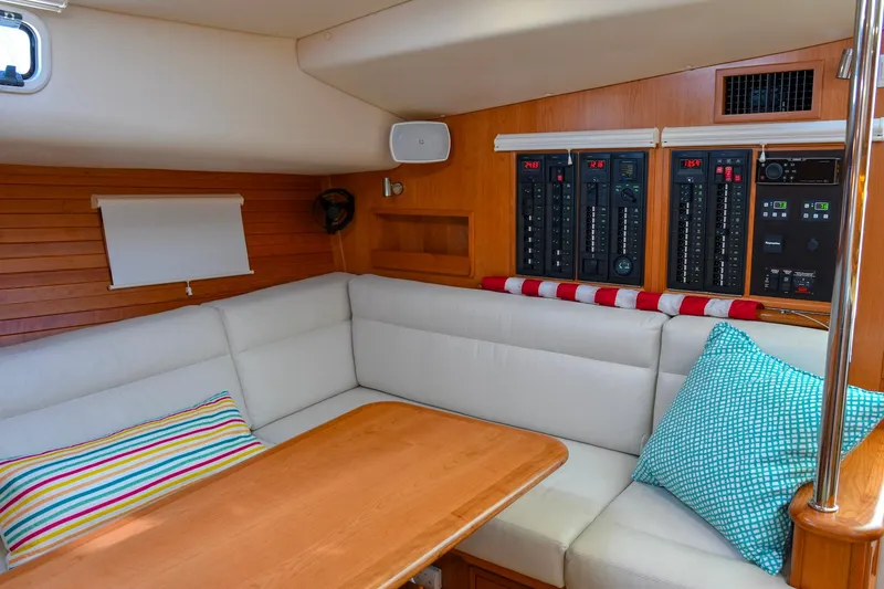 Slide: The Image of Luxurious interior of 2018 MJM 50z yacht with cozy seating and control panels. - 29