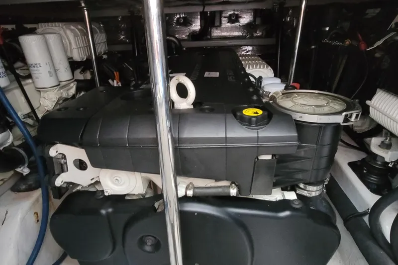 Slide: The Image of Engine room of 2018 MJM 50z yacht, showcasing mechanical components and filters. - 43