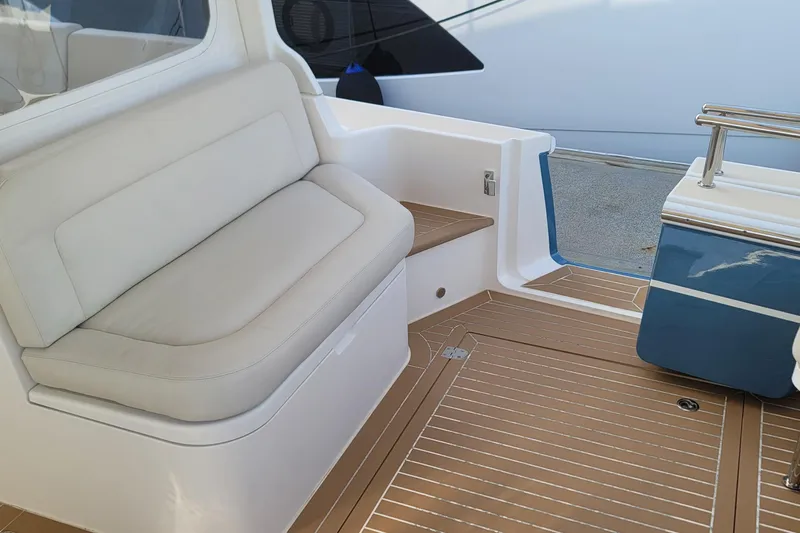 Slide: The Image of Luxurious seating area on 2018 MJM 50z yacht with teak flooring. - 52