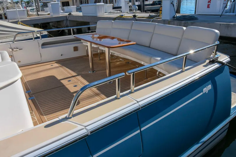 Slide: The Image of Luxury deck of 2018 MJM 50z yacht with seating and table. - 9
