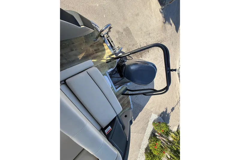 Slide: The Image of 2019 Crest Caribbean 250 SLS boat with seating and motor, viewed from above. - 27