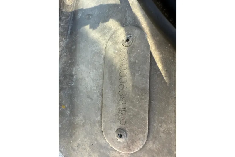 Slide: The Image of Close-up of a 2019 Crest Caribbean 250 SLS identification plate. - 28