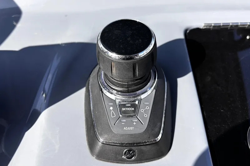 Slide: The Image of Control panel of 2026 Tidewater 3100 Carolina Bay boat with engine start button. - 27