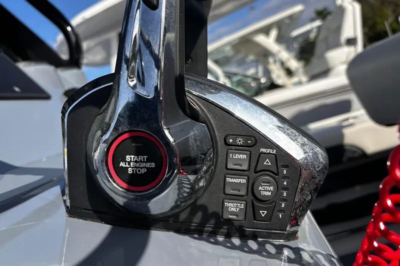 Slide: The Image of Control panel of 2026 Tidewater 3100 Carolina Bay boat with caution labels and Zipwake system. - 28