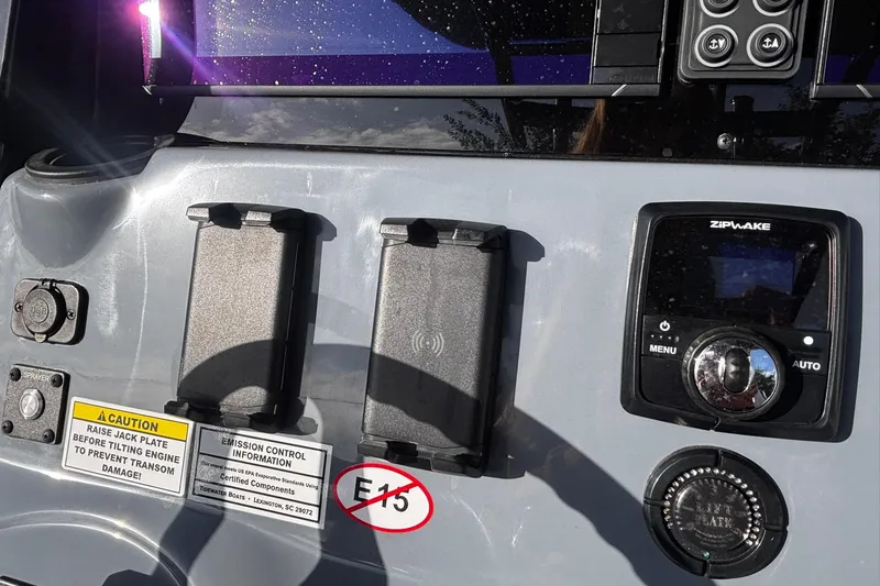 Slide: The Image of Dashboard of 2026 Tidewater 3100 Carolina Bay with dual Simrad displays. - 29