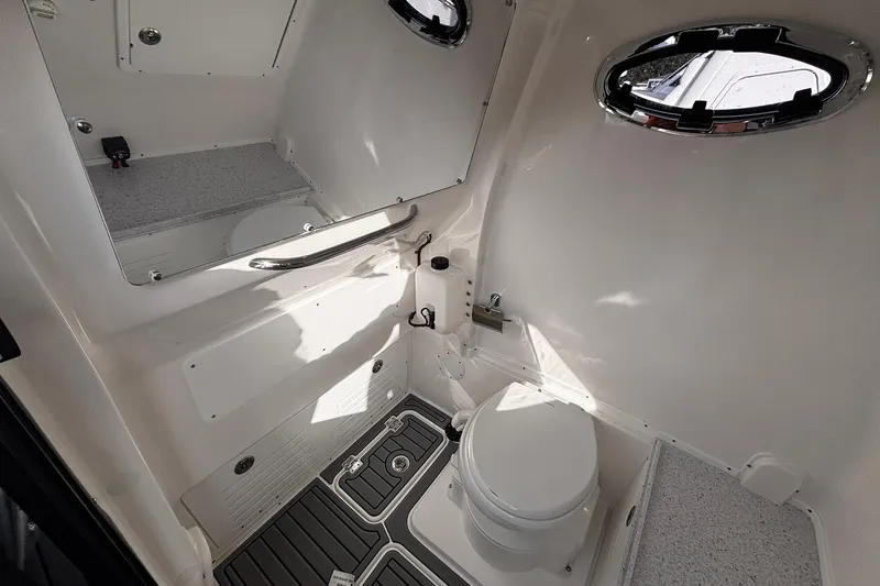 Slide: The Image of 2026 Tidewater 3100 Carolina Bay boat interior with sleek seating and modern design. - 38