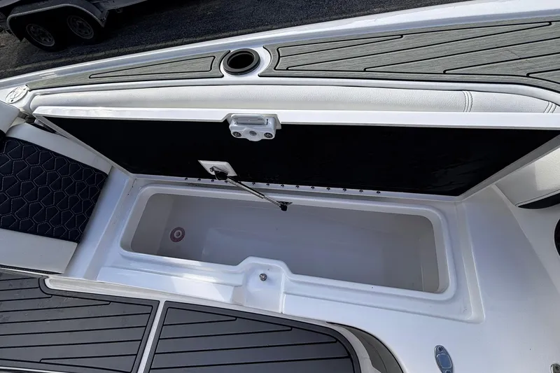 Slide: The Image of Open storage compartment on 2026 Tidewater 3100 Carolina Bay boat. - 41