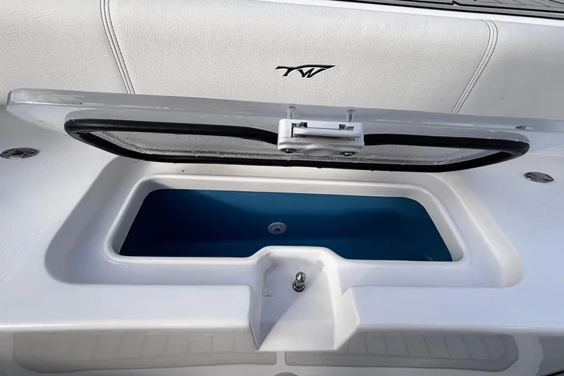 Slide: The Image of 2026 Tidewater 3100 Carolina Bay boat deck with sleek, modern design in a marina setting. - 42