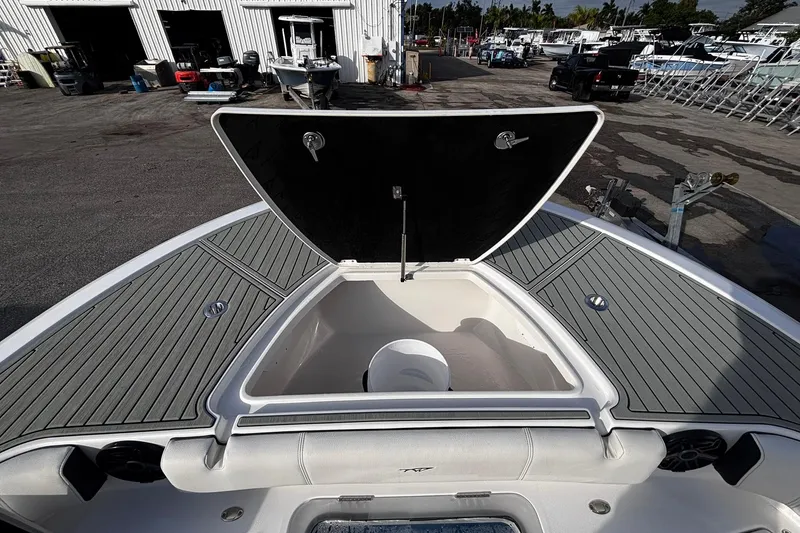 Slide: The Image of 2026 Tidewater 3100 Carolina Bay boat anchor compartment with open hatch. - 44