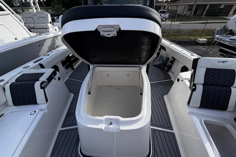 Slide: The Image of 2026 Tidewater 3100 Carolina Bay boat with mounted camera and LED lights. - 47