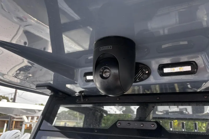 Slide: The Image of 2026 Tidewater 3100 Carolina Bay boat with ABYC membership sticker and serial number. - 48