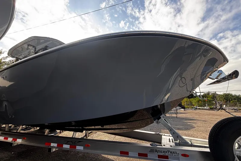Slide: The Image of 2026 Tidewater 3100 Carolina Bay boat on trailer, side view. - 5