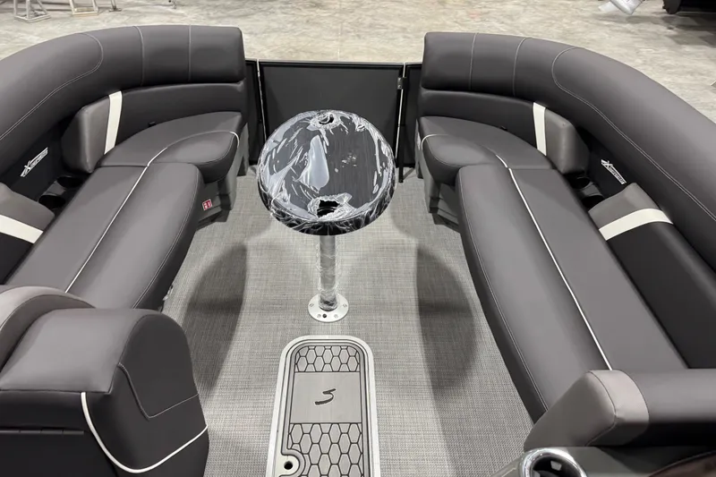Slide: The Image of Luxurious interior of 2026 Sylvan X 5 boat with sleek seating and modern table design. - 12