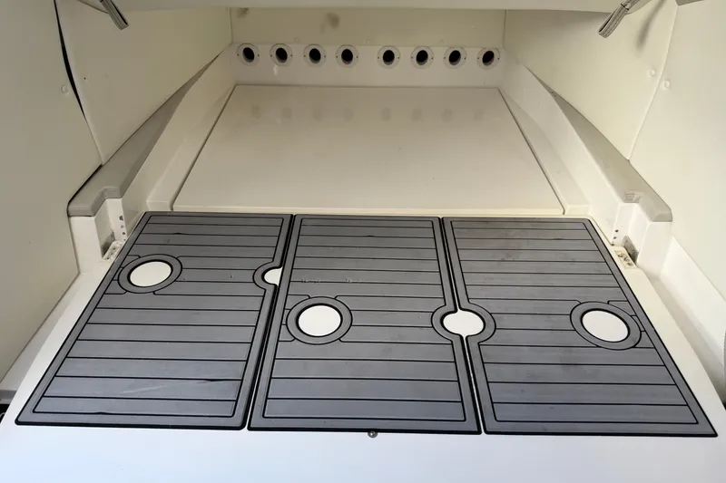 Slide: The Image of 2019 MTI V42 boat deck with non-slip surface and drainage holes. - 21