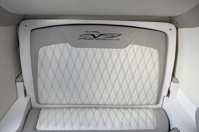 Slide: The Image of White quilted seat in 2019 MTI V42 boat interior. - 24