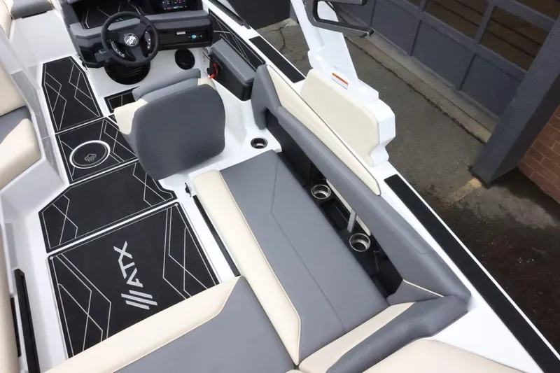 Slide: The Image of 2026 ATX Surf Boats 22 Type-S interior with sleek seating and modern dashboard design. - 12