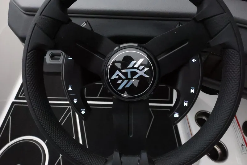 Slide: The Image of Steering wheel of 2026 ATX Surf Boats 22 Type-S with control buttons. - 21