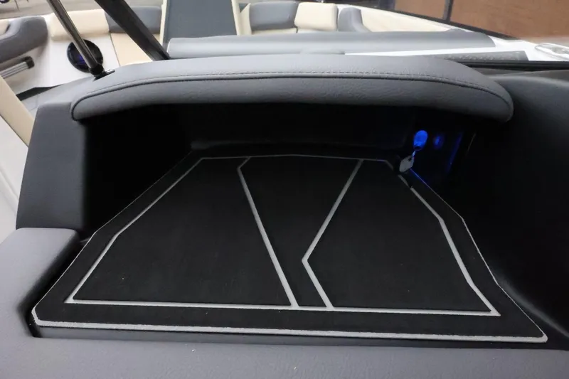 Slide: The Image of Interior view of 2026 ATX Surf Boats 22 Type-S, featuring sleek dashboard design. - 22