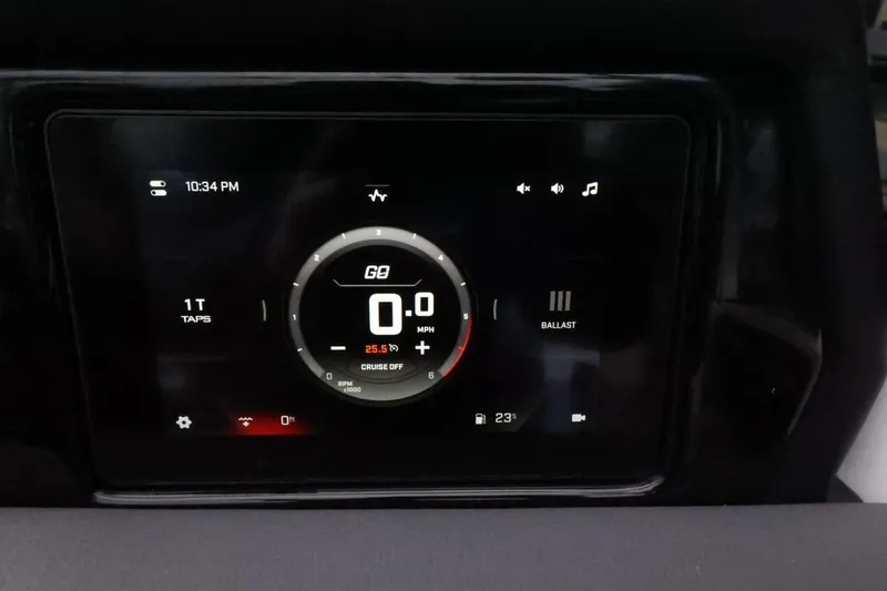 Slide: The Image of 2026 ATX Surf Boats 22 Type-S dashboard display showing speed, time, and settings. - 23