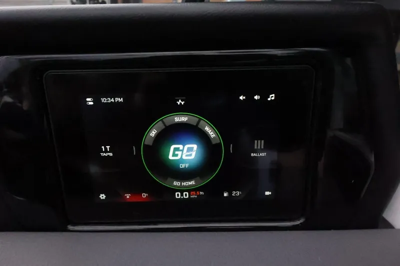 Slide: The Image of Touchscreen display of 2026 ATX Surf Boats 22 Type-S showing surf and wake settings. - 24