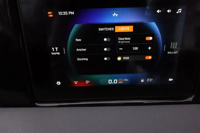 Slide: The Image of Touchscreen control panel of 2026 ATX Surf Boats 22 Type-S, displaying navigation and lighting settings. - 27