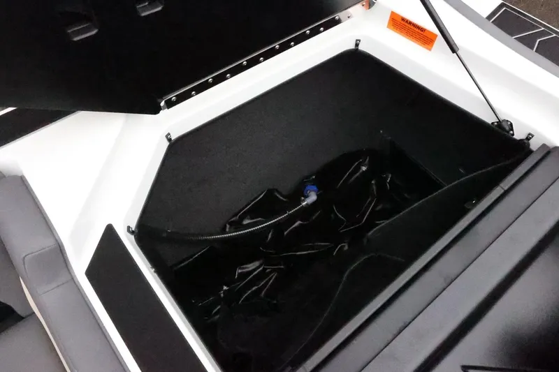 Slide: The Image of Open storage compartment of 2026 ATX Surf Boats 22 Type-S, showcasing interior space. - 41