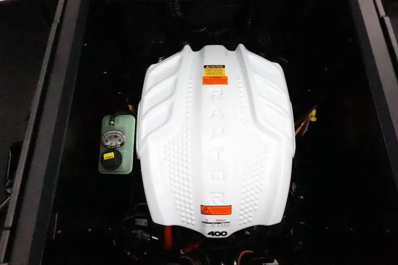 Slide: The Image of 2026 ATX Surf Boats 22 Type-S engine with white Raptor cover. - 43